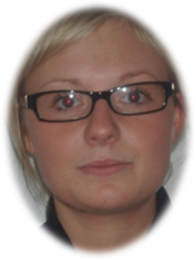 Person with glasses looking at the camera.