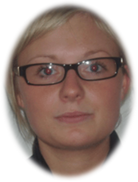 Person with glasses looking at the camera.