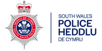 Logo of South Wales Police with emblem and bilingual text.