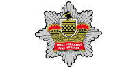 West Midlands Fire Service emblem, a badge with a crowned lion and red banners.