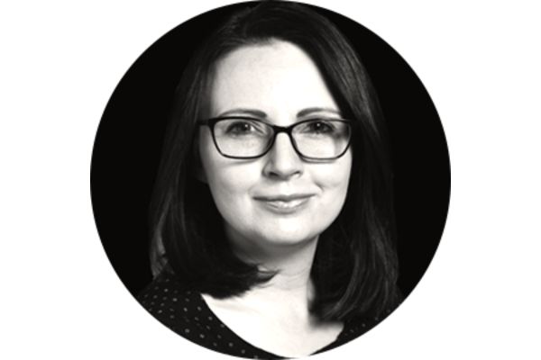 Portrait of a person with glasses.