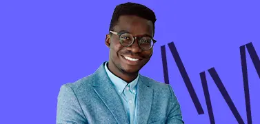 A young man, smiling brightly