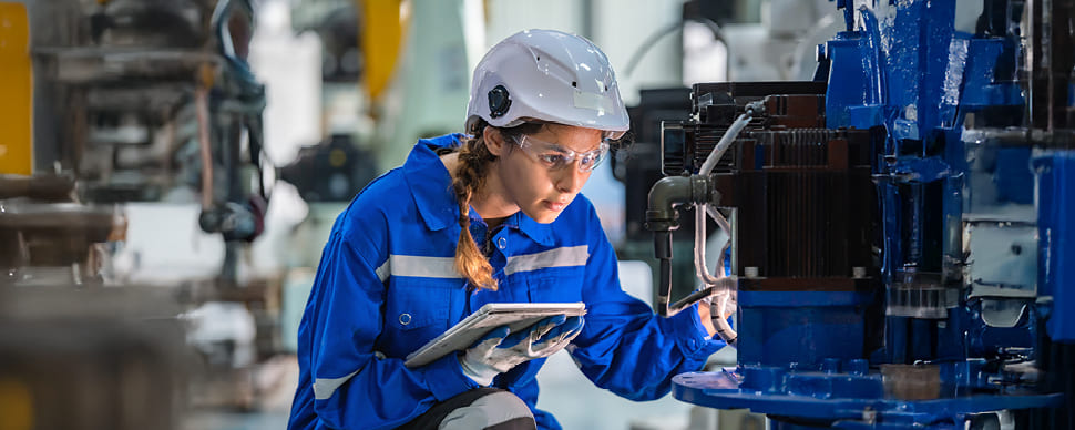 An engineer working on a machine