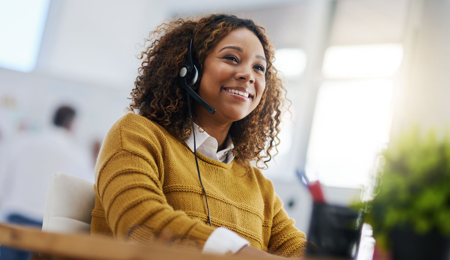 young woman wearing a headset