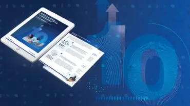 Tablet displaying healthcare report next to printed pages with graphs and text, on a blue background.