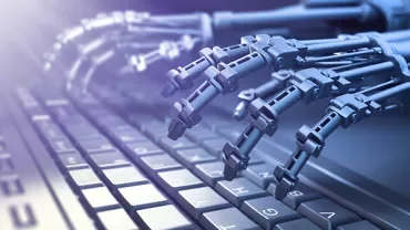 Robotic hands typing on a computer keyboard with a glowing light effect.