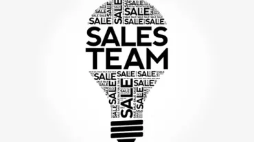 Light bulb shape with the words 'Sales Team' and 'Sale' repeated inside.