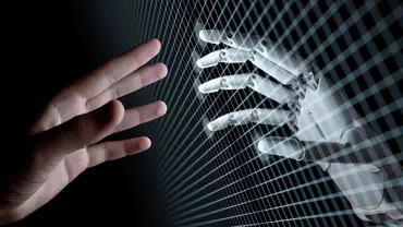 Human hand reaching toward a robotic hand through a digital grid.