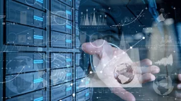 Outstretched hand in front of servers with data graphics overlay.