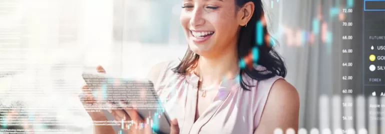Person smiling at digital tablet with financial data overlay.
