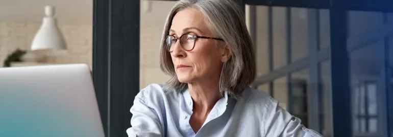 professional woman looking at her computer
