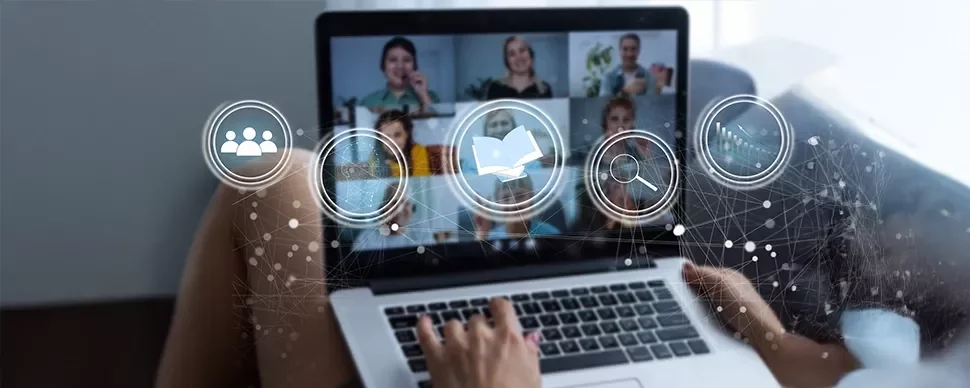 A person taking a training course on a laptop