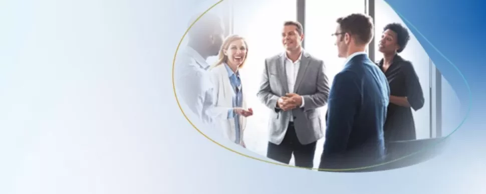 5 people talking in an office setting