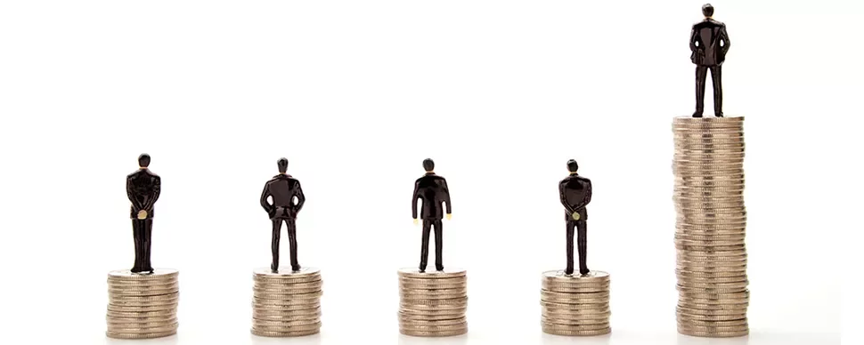Figurines standing on stacks of coins at different heights.
