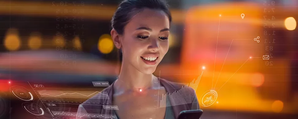 Person using a smartphone with data graphs overlay.