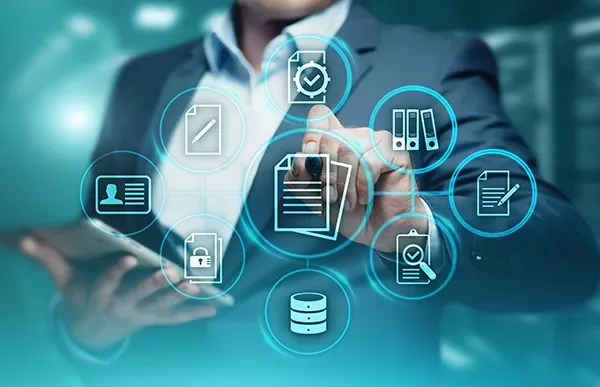 Person using a digital interface with various icons representing data management and tasks.