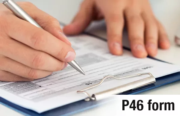 Person filling out a form on a clipboard with a pen.
